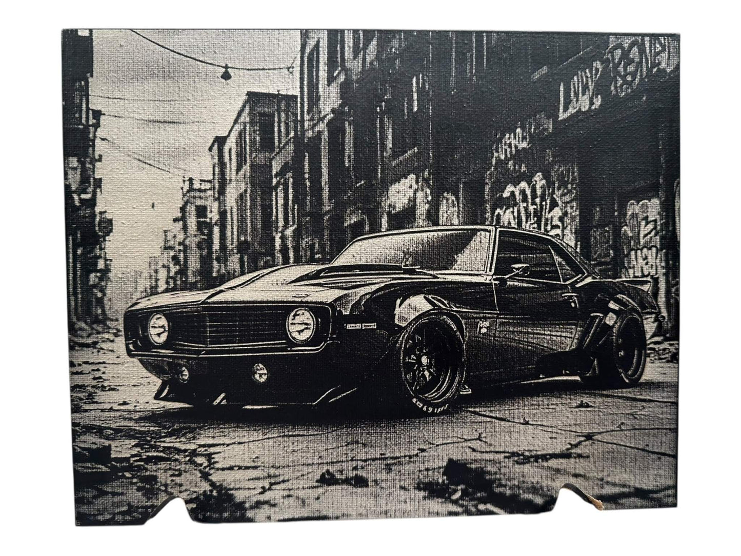 Engraved black and white hand-painted canvas wall art featuring a classic car in an urban setting.