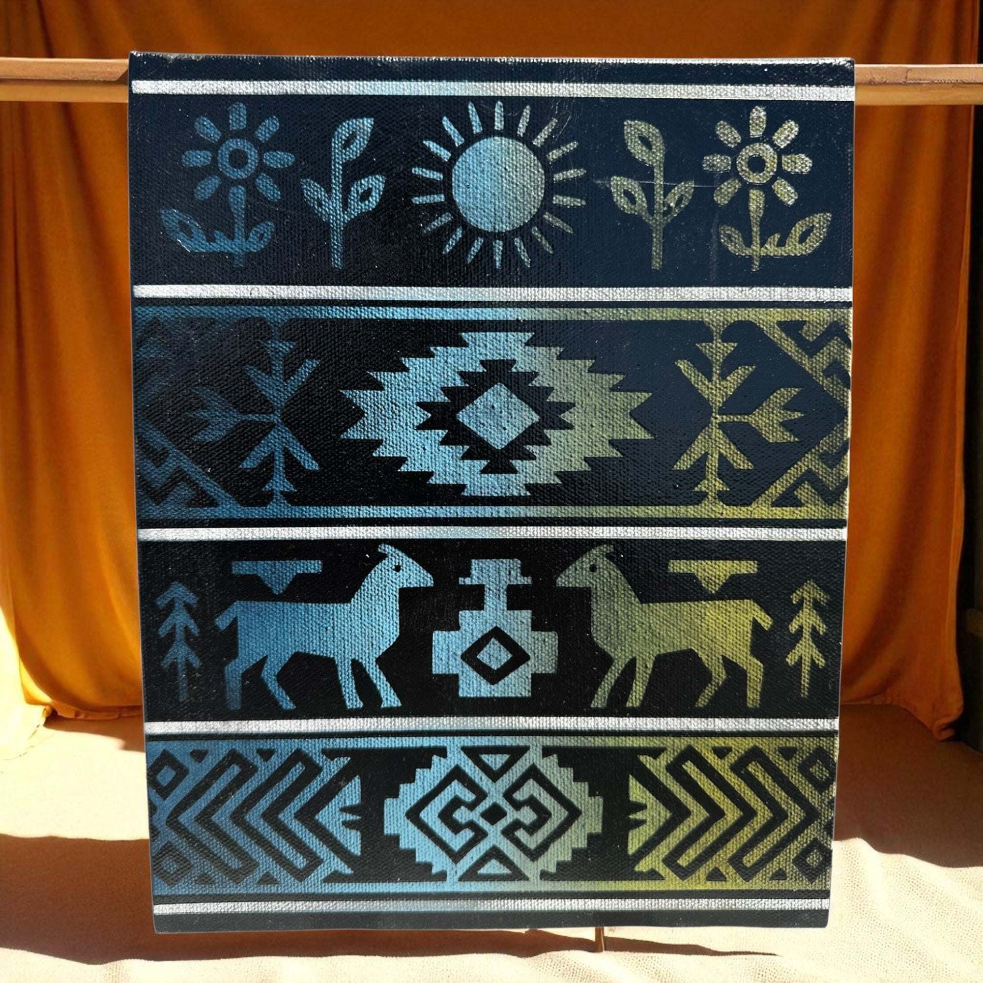 Canvas art featuring laser-engraved traditional woven Latin blanket patterns with sun, flowers, horses, and geometric designs on 8x10 canvas.