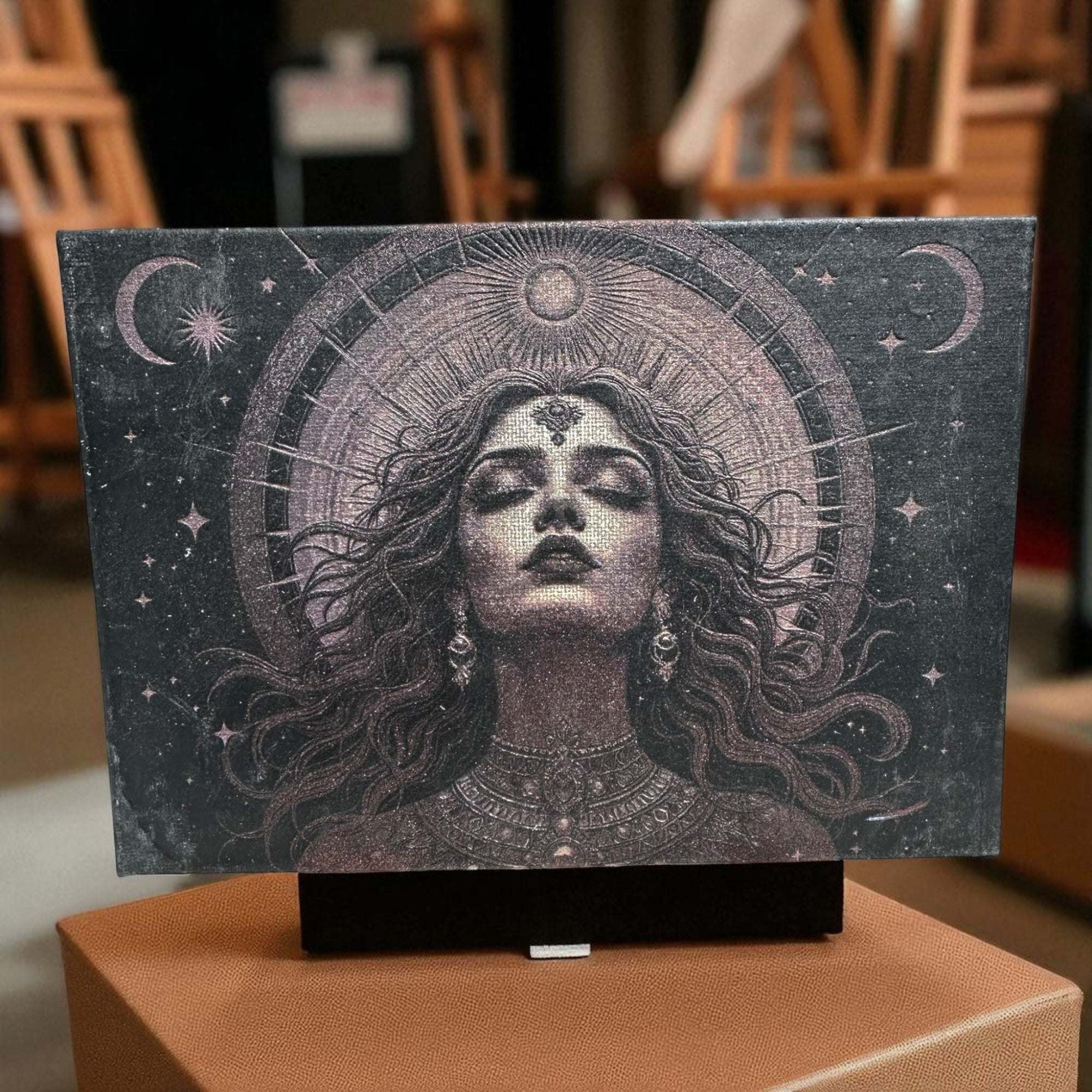 Laser-engraved 5x7 canvas art of a mythical goddess with celestial motifs and intricate details