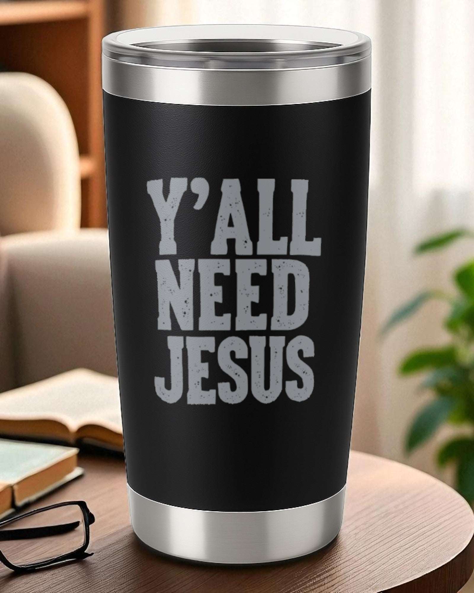 20oz black stainless steel tumbler with engraved "Y’all Need Jesus" text and clear lid.