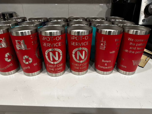 Custom engraved 20oz tumblers with company logos in red, ideal for promotional business gifts.