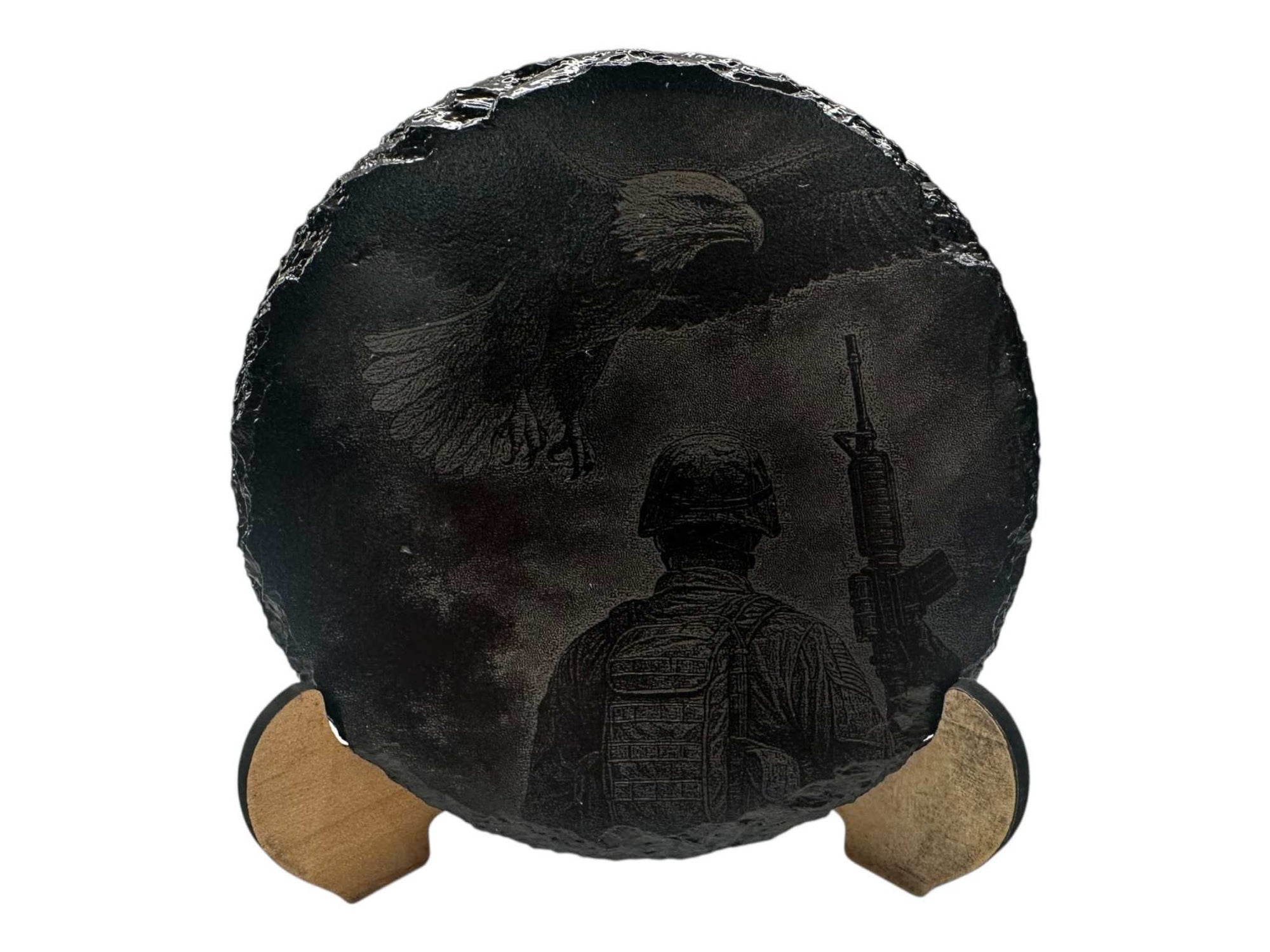 Hand-painted slate coaster with greyscale art featuring an eagle and soldier, round shape, 100mm diameter.