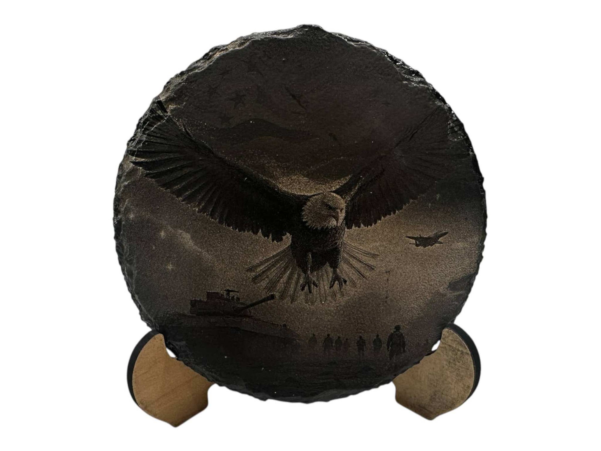 Round hand-painted slate coaster featuring a greyscale eagle design in black and white acrylic.