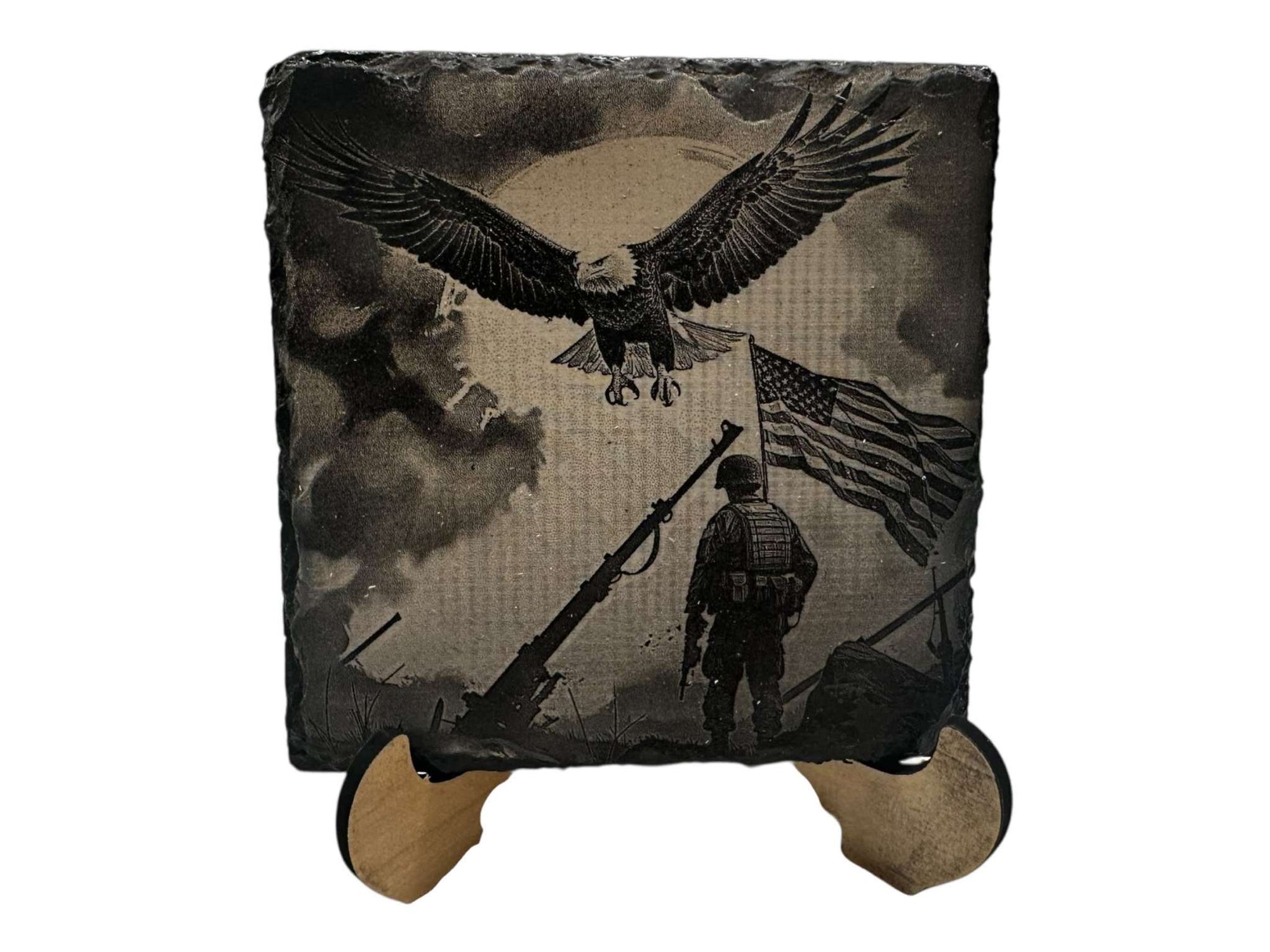 Hand-painted slate coaster with greyscale eagle and soldier design, featuring a black and white art style.