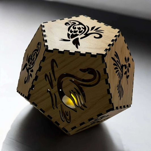 Dodecahedron tealight lantern with intricate laser-cut designs casting shadows, available DIY or pre-assembled.