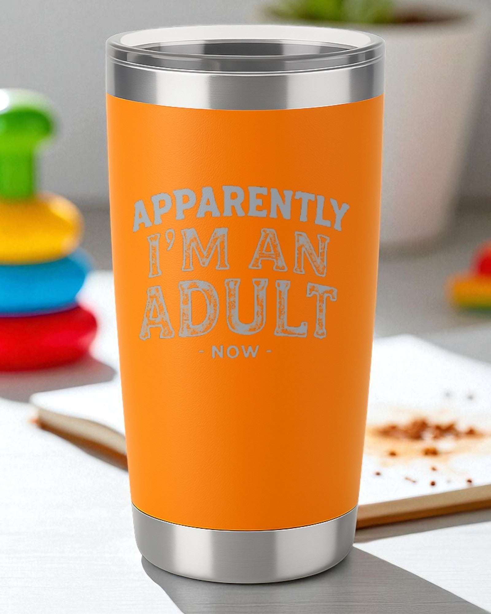 Orange funny adulting tumbler with "Apparently I'm An Adult Now" laser engraved text