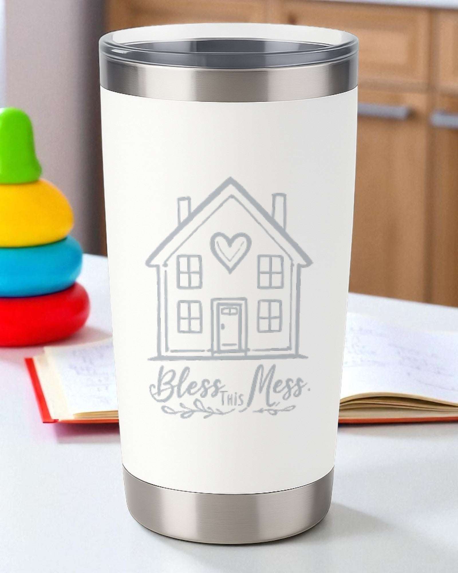 White insulated tumbler engraved with a house and "Bless This Mess" text for home and family use
