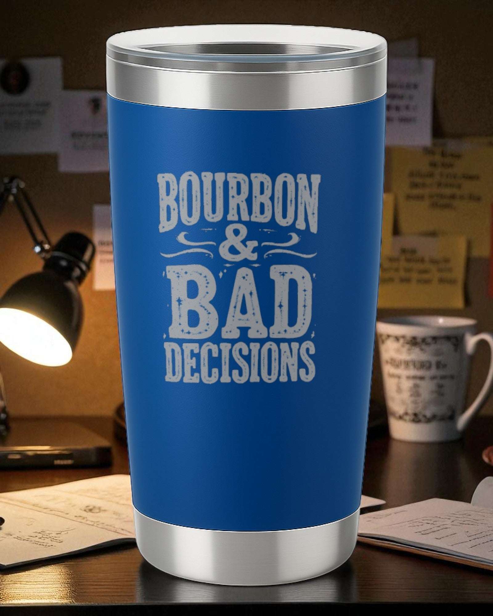 Blue engraved whiskey tumbler with "Bourbon & Bad Decisions" text for classy nights.