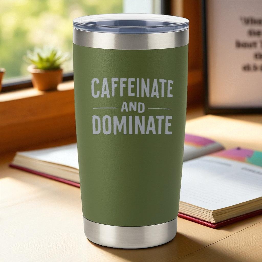 20oz green stainless steel tumbler with "Caffeinate and Dominate" laser-engraved text, double-wall insulated with clear lid.