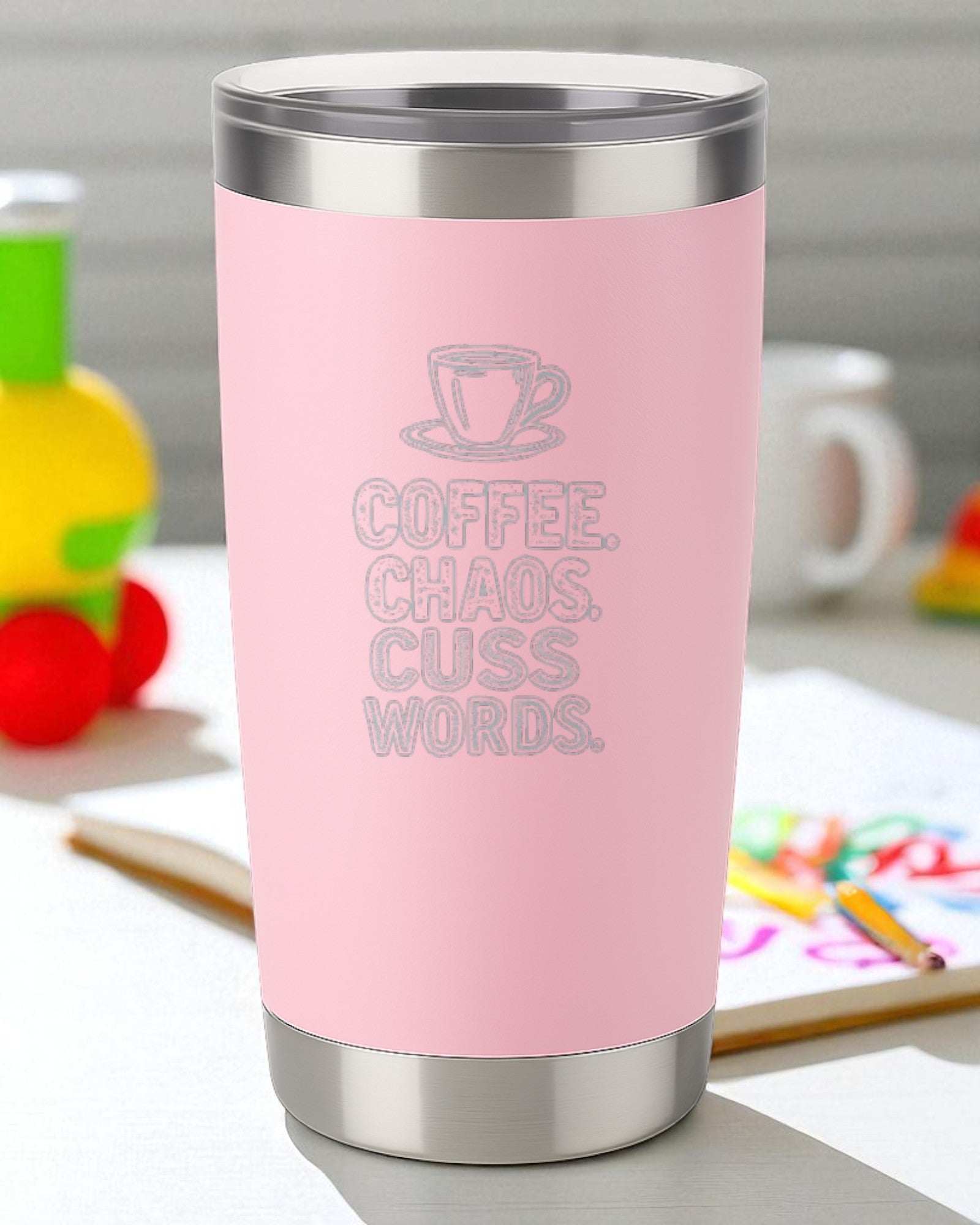 Pink stainless steel Chaotic Coffee Tumbler with "Coffee. Chaos. Cuss Words." text and coffee cup illustration.
