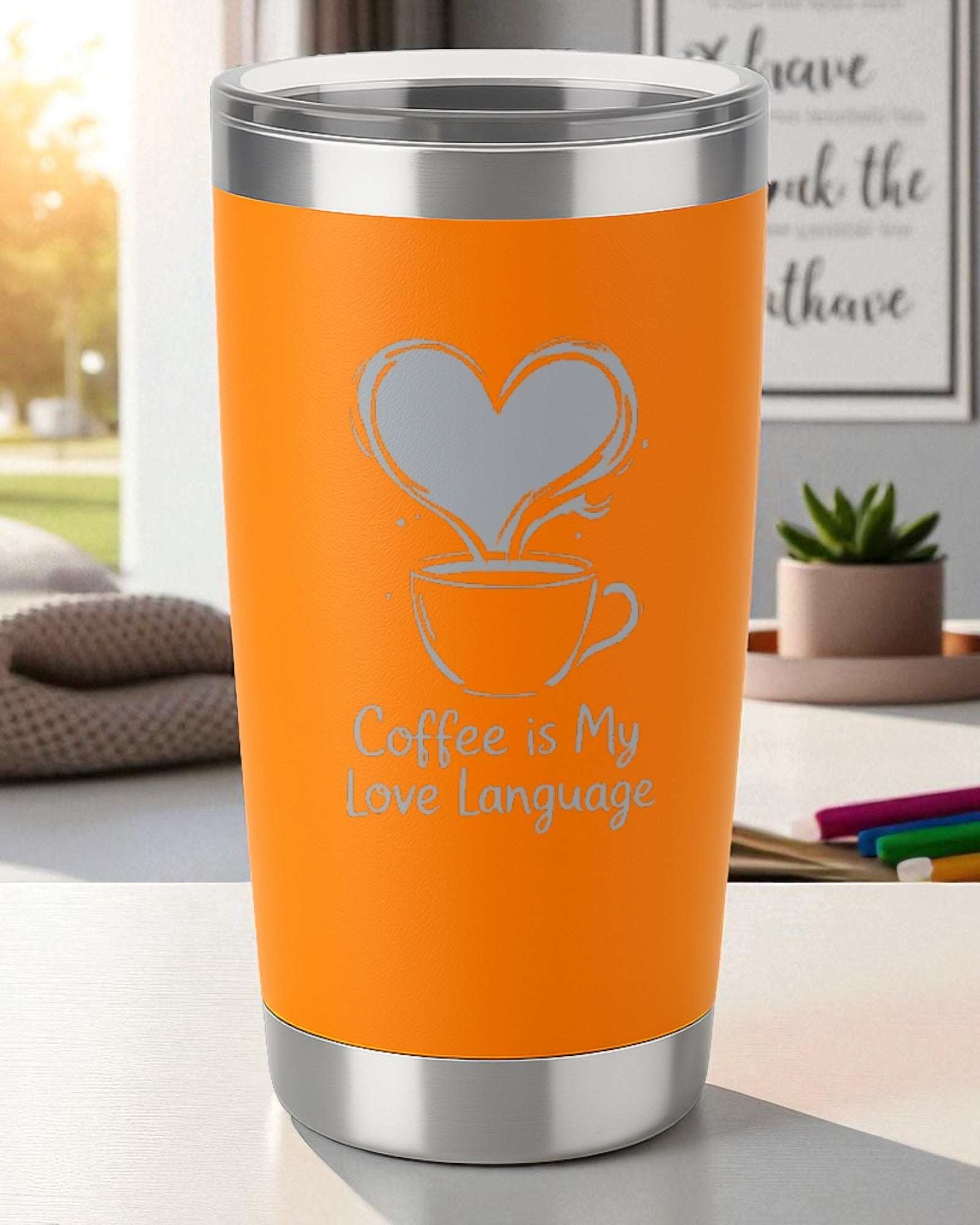 Orange coffee tumbler engraved with heart steam and text "Coffee is My Love Language"