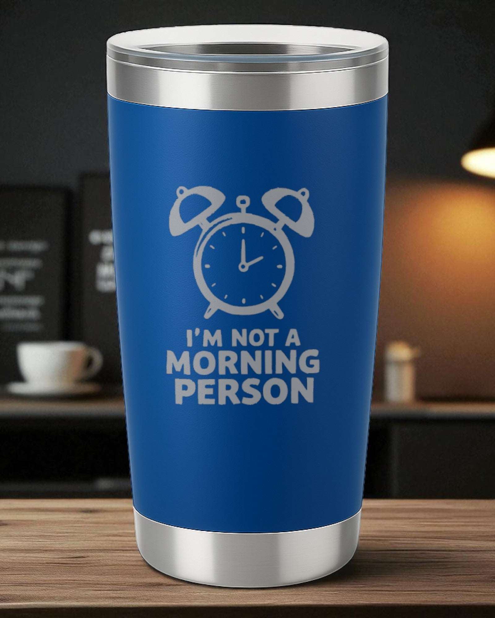 Blue relatable tumbler with "I’m Not a Morning Person" text and alarm clock design.