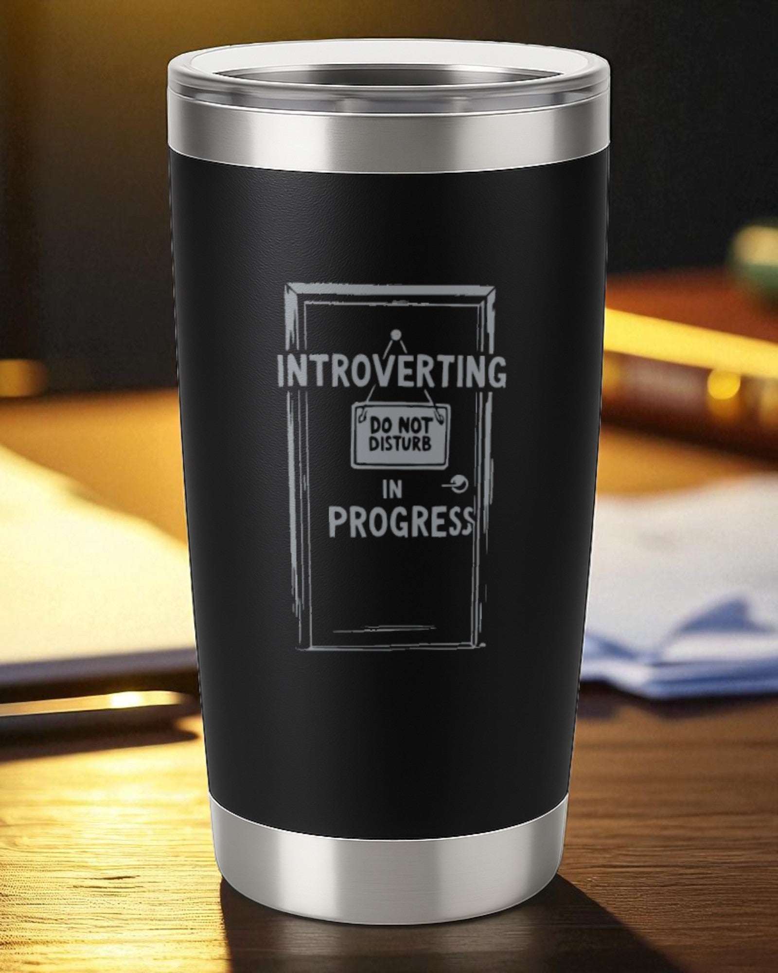 20oz black engraved stainless steel tumbler with "Introverting in Progress" design and clear slider lid