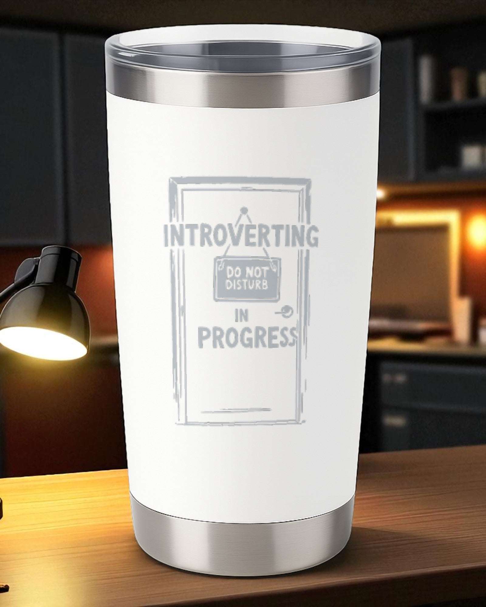 20oz white engraved stainless steel tumbler with "Introverting in Progress" design and clear lid with slider