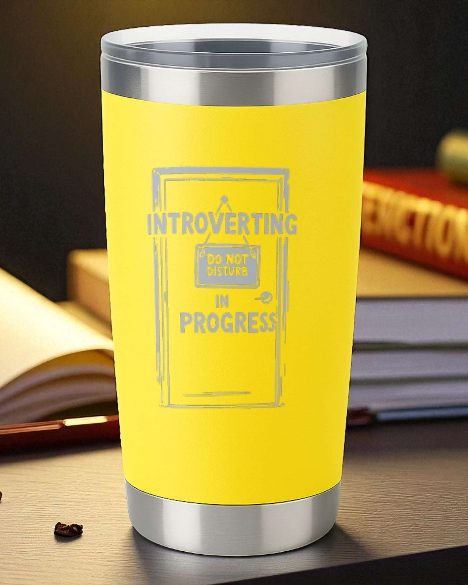 20oz yellow engraved tumbler with "Introverting in Progress" design and clear slider lid