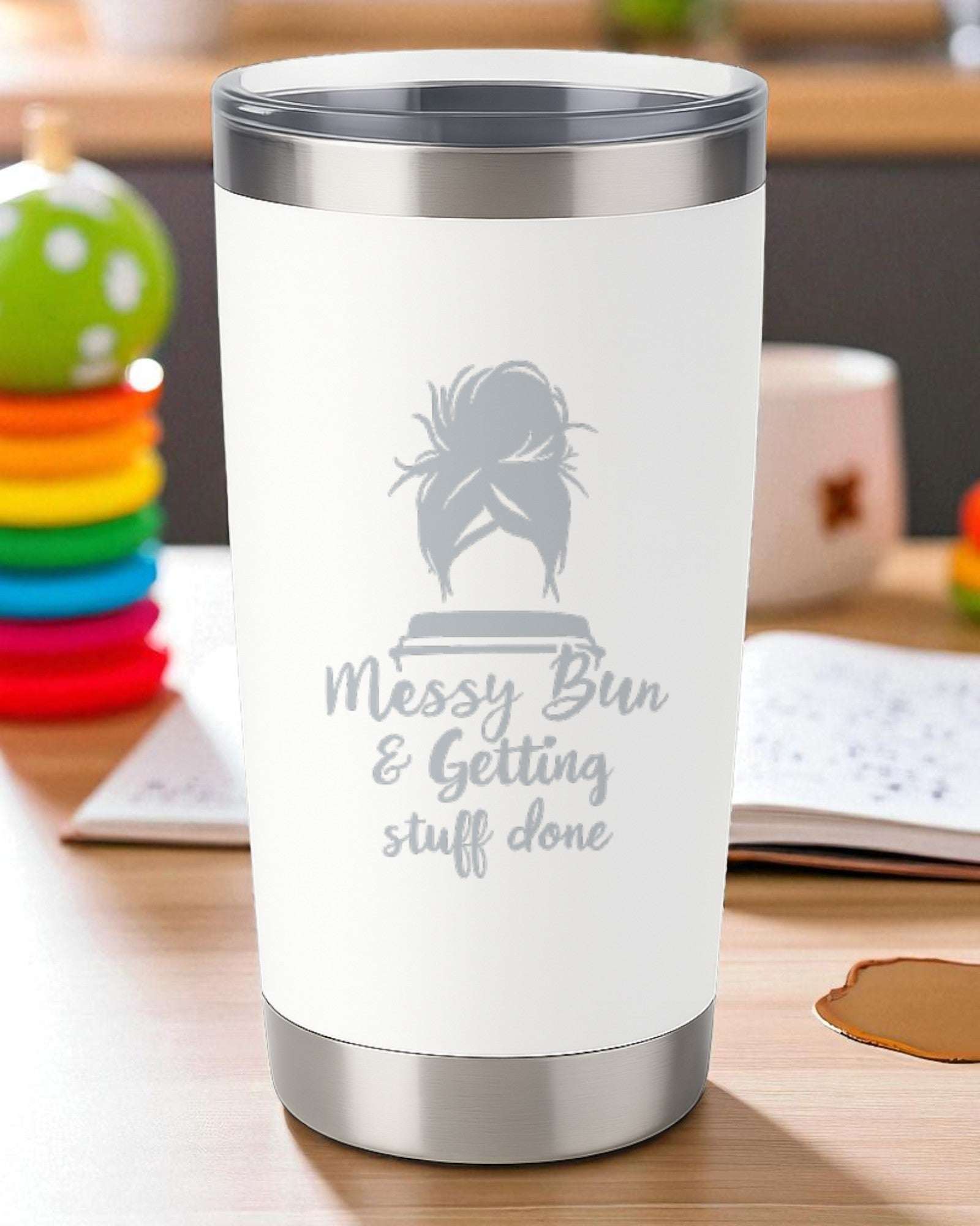 White productivity tumbler with stainless steel rim featuring "Messy Bun & Getting Stuff Done" text and messy bun graphic.