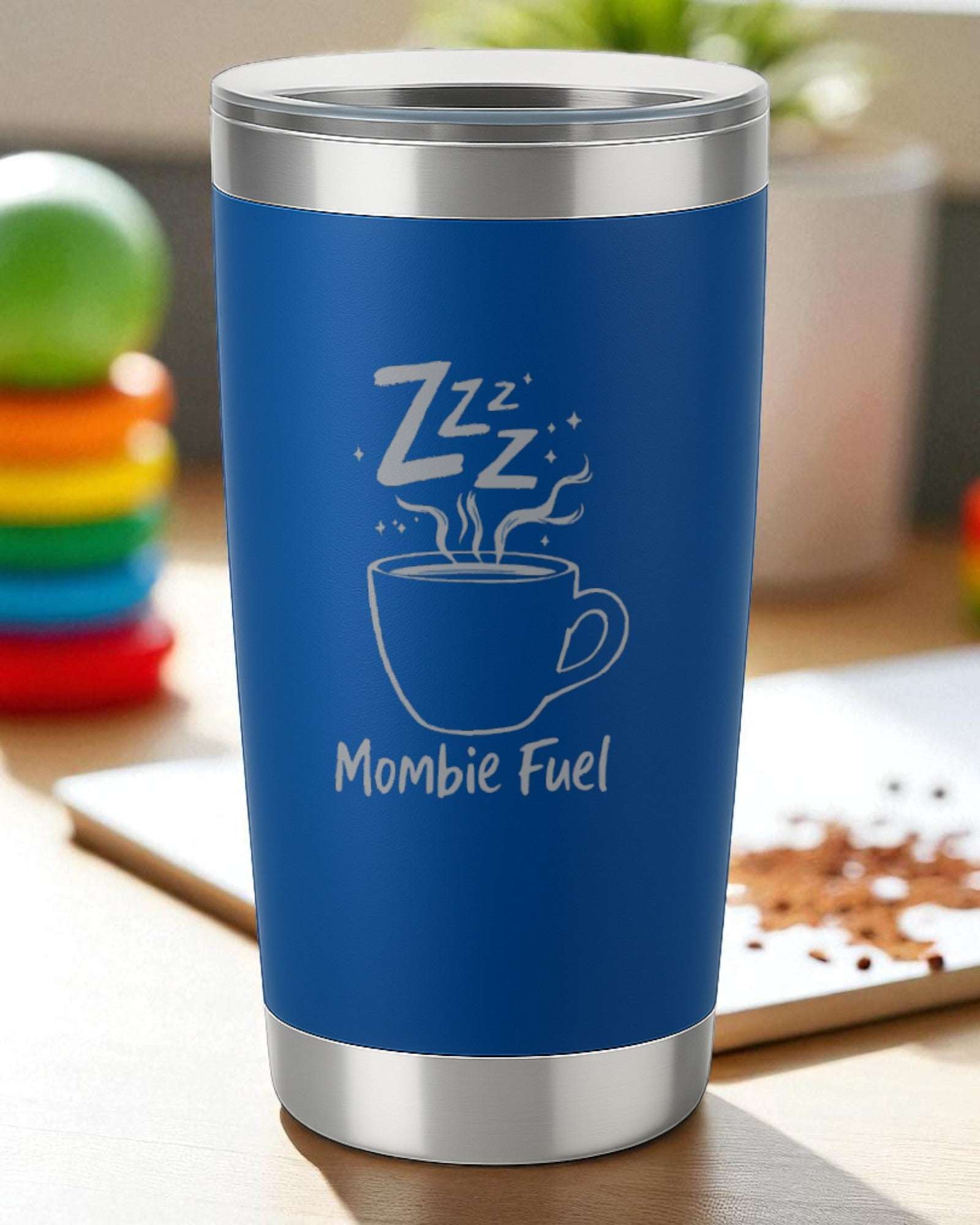 Blue engraved tumbler with "Mombie Fuel" and steaming coffee cup design for moms.