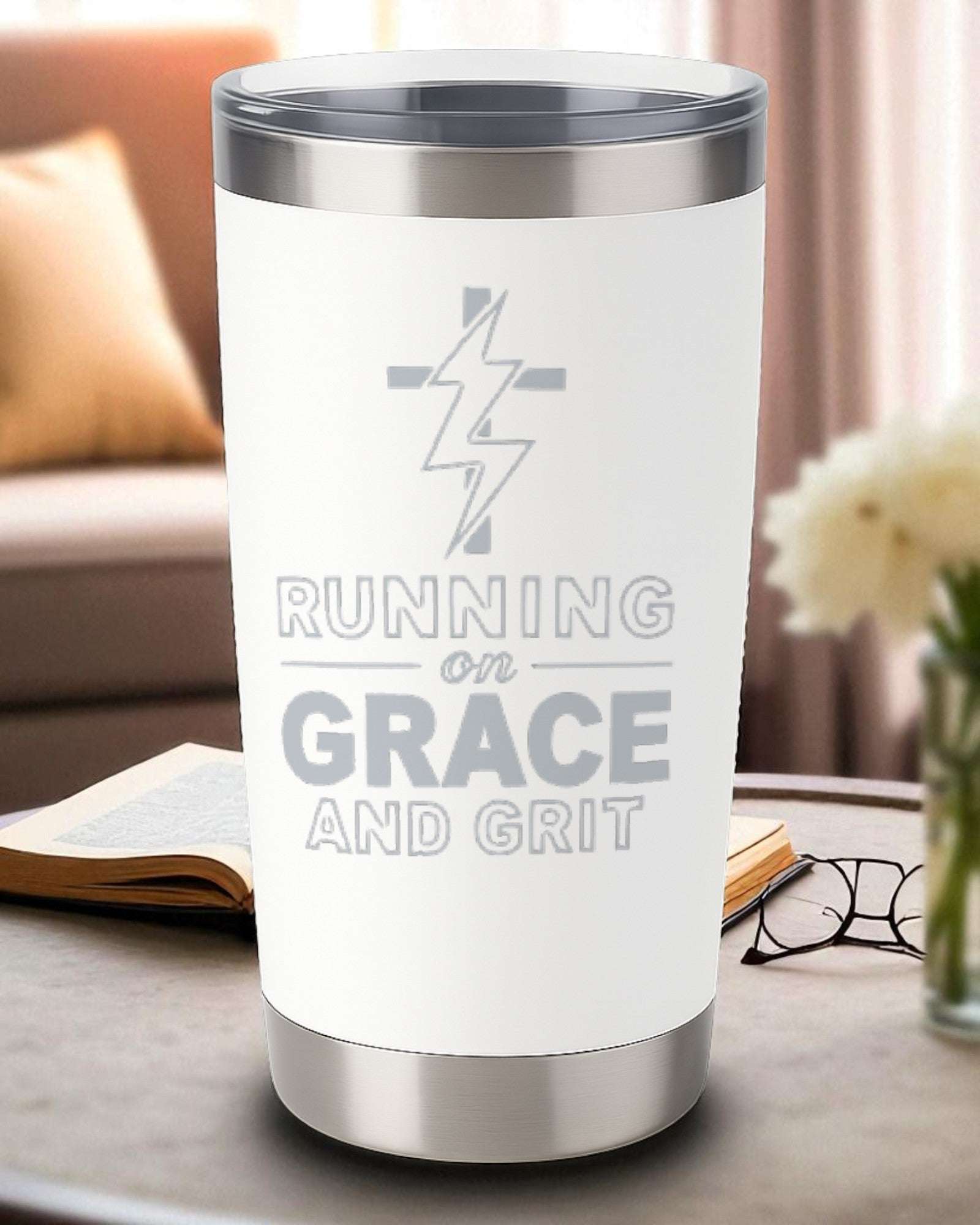 20oz white engraved tumbler with "Running on Grace and Grit" text and cross design, double-wall insulated with clear lid