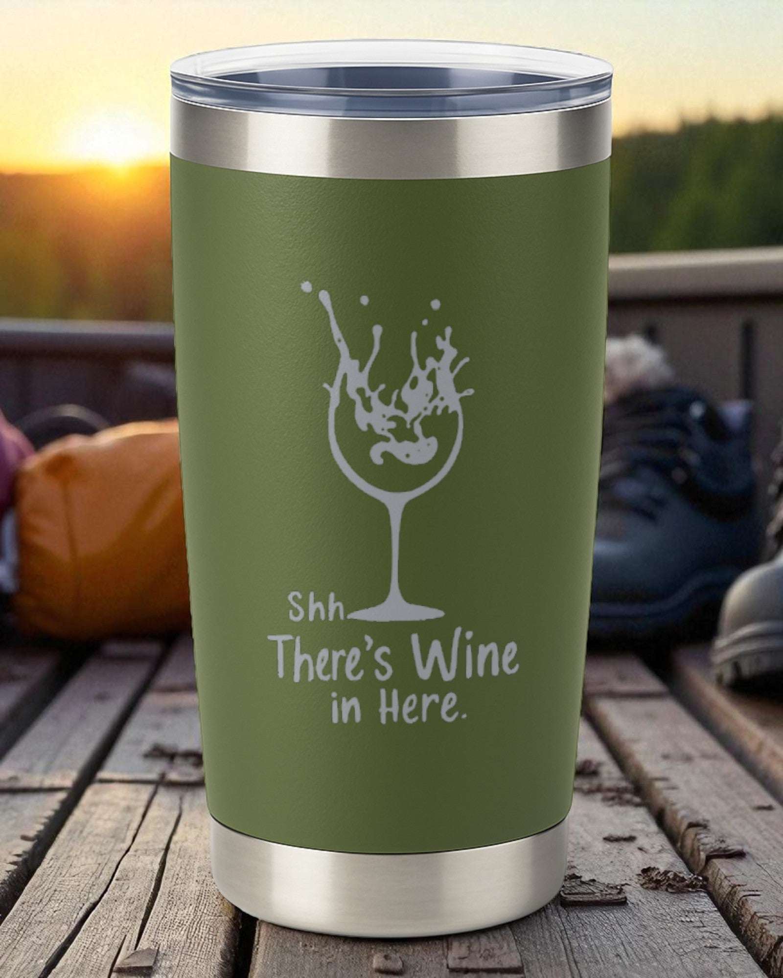 20oz green stainless steel tumbler with "Shhh… There’s Wine in Here" laser-engraved text and wine glass design, clear lid included