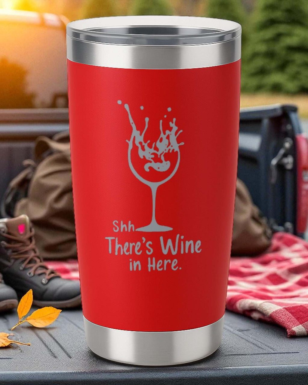 Red 20oz stainless steel tumbler with "Shhh… There’s Wine in Here" engraved and splash wine glass design