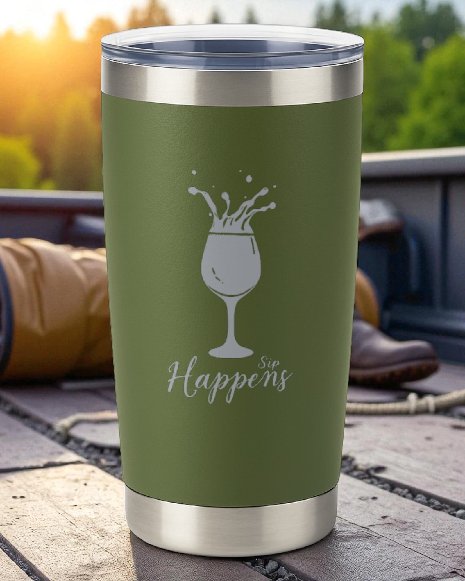 Green 20oz Sip Happens engraved insulated tumbler with clear slide lid outdoors