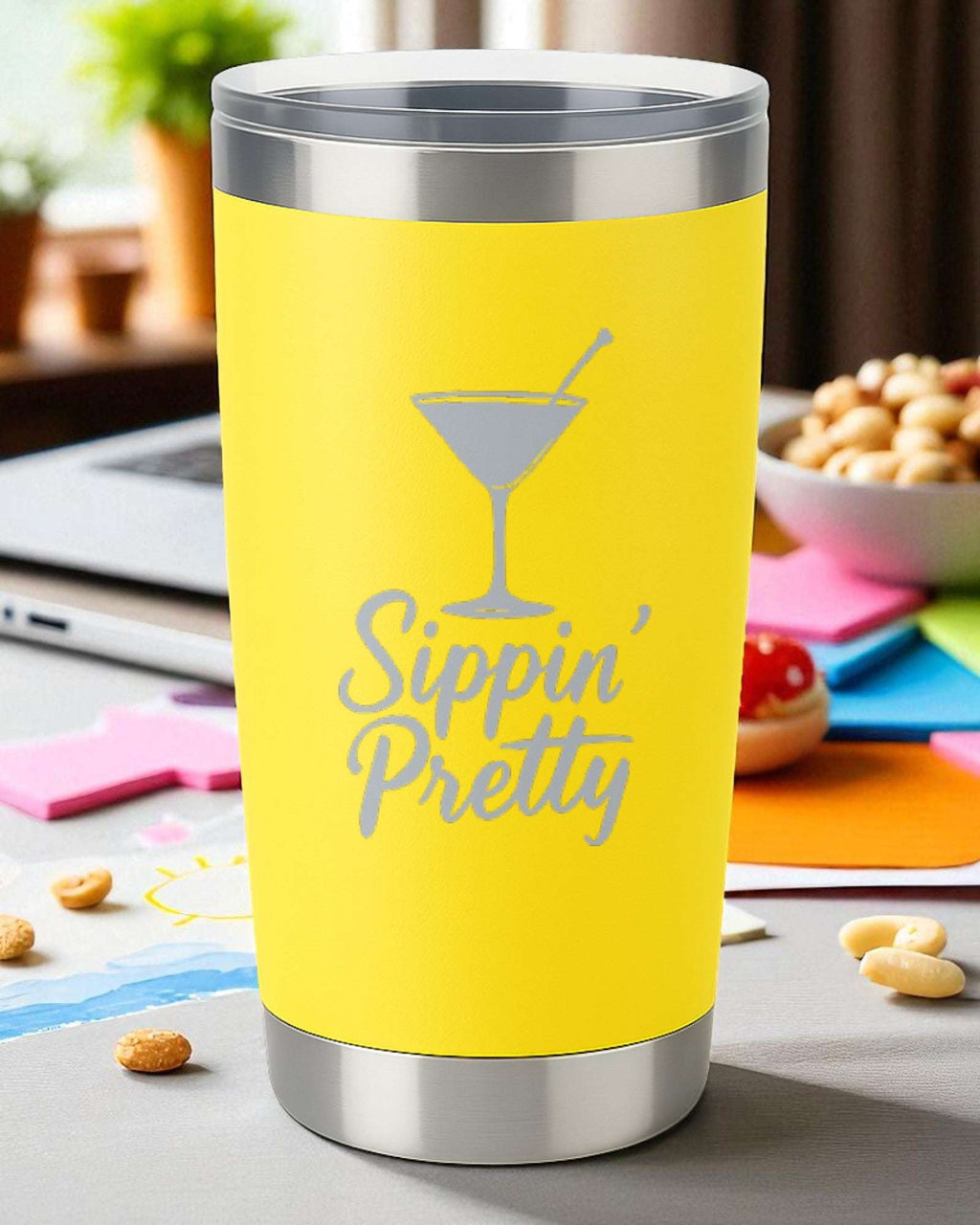 Yellow 20oz stainless steel tumbler with "Sippin' Pretty" engraved text and martini glass design, double-walled insulation.