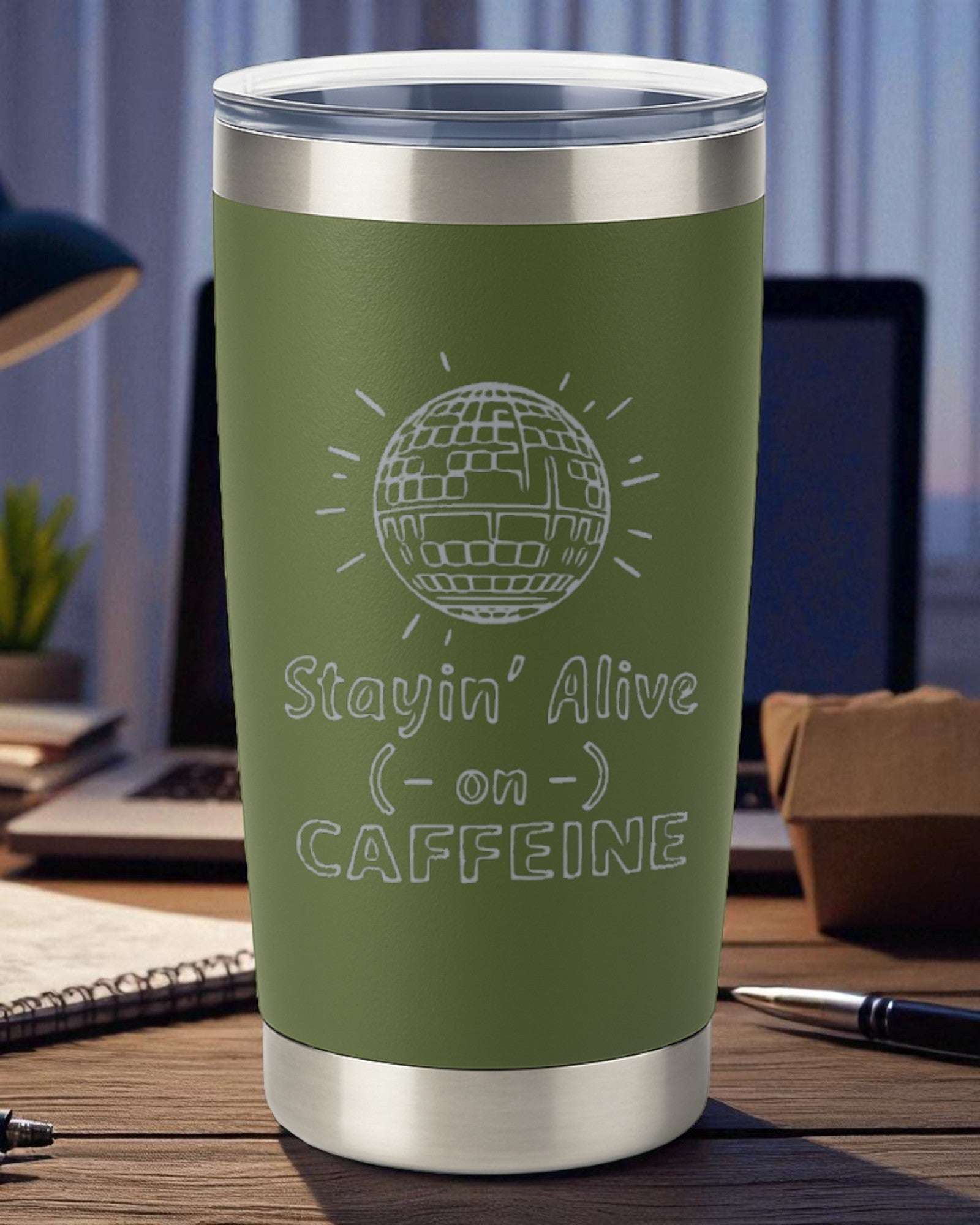 20oz green stainless steel retro coffee tumbler engraved with "Stayin' Alive on Caffeine" and disco ball design, vacuum insulated with clear lid