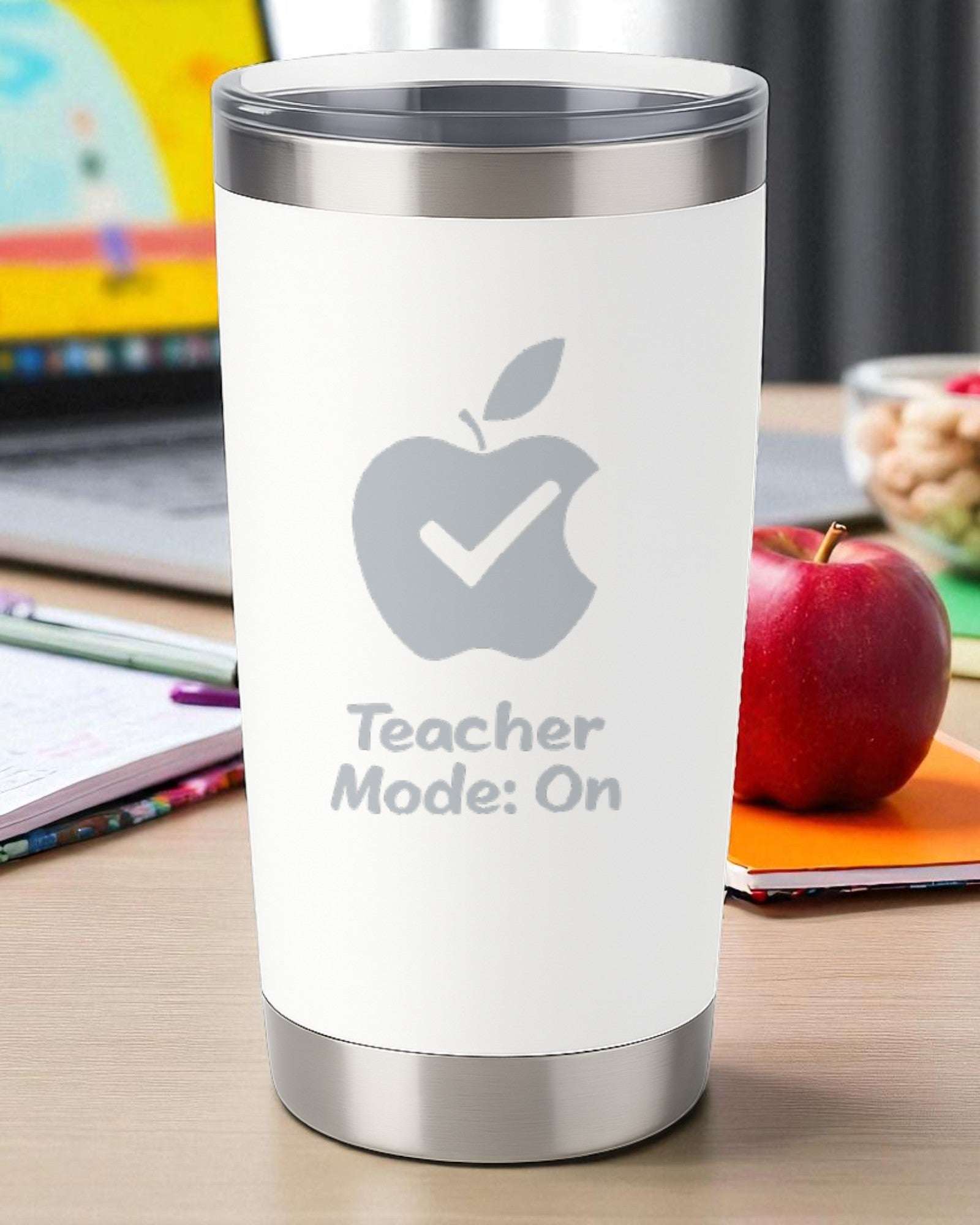 20oz double-wall insulated white tumbler engraved with "Teacher Mode: On" text and apple design, ideal teacher appreciation tumbler.