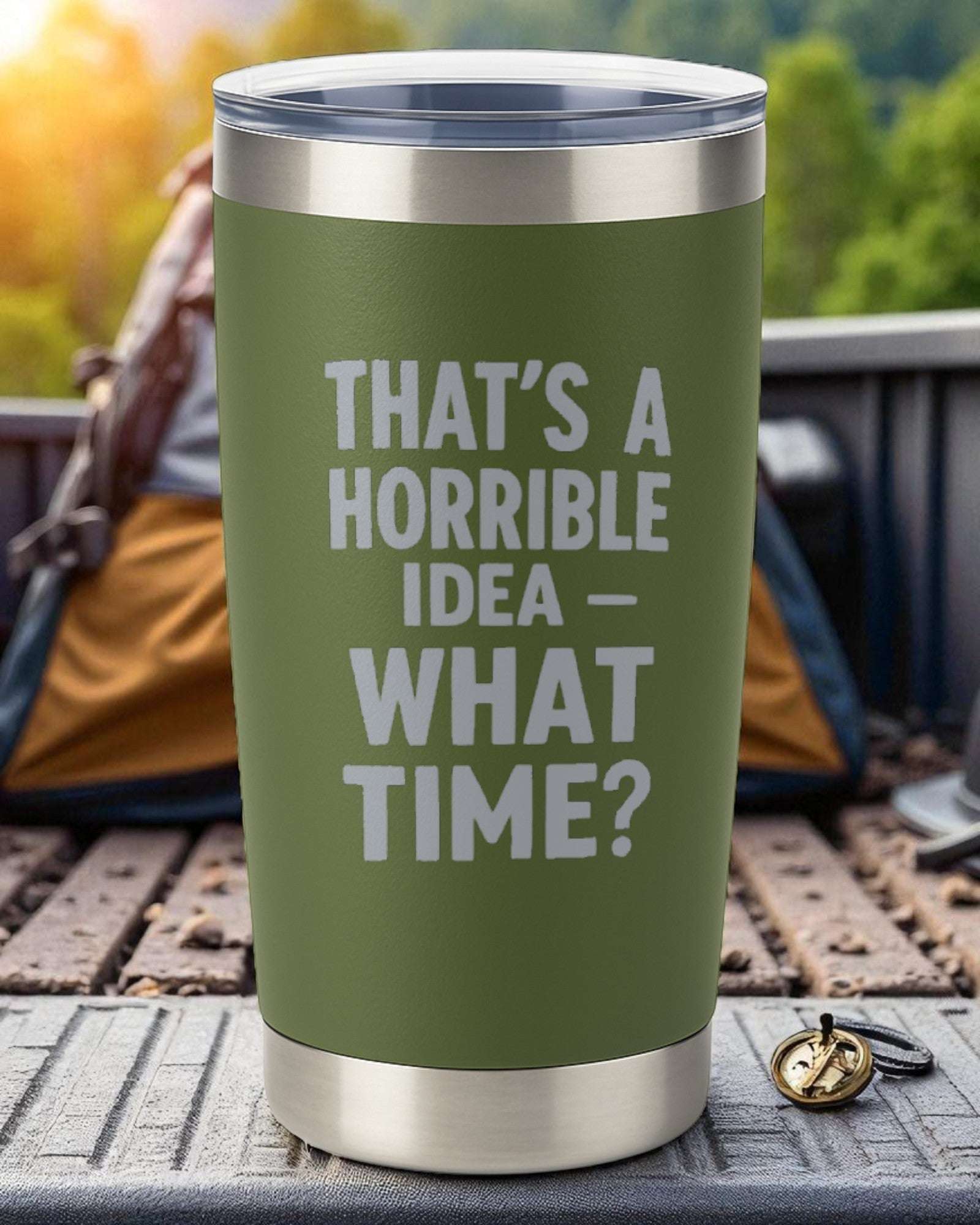 20oz green stainless steel tumbler with engraved "That's a Horrible Idea – What Time?" text and clear lid.