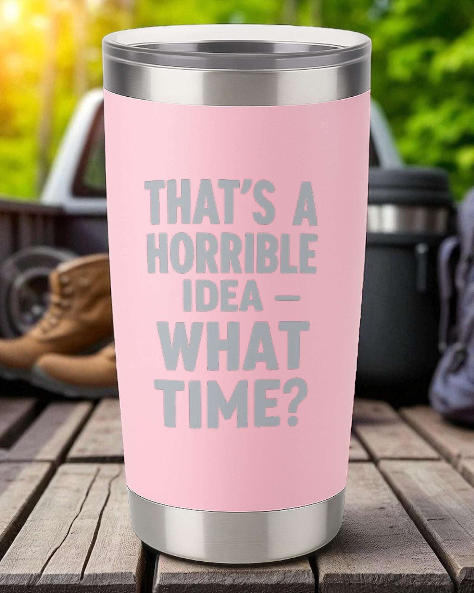 20oz pink stainless steel tumbler with engraved "That's a Horrible Idea – What Time?" text and clear lid.