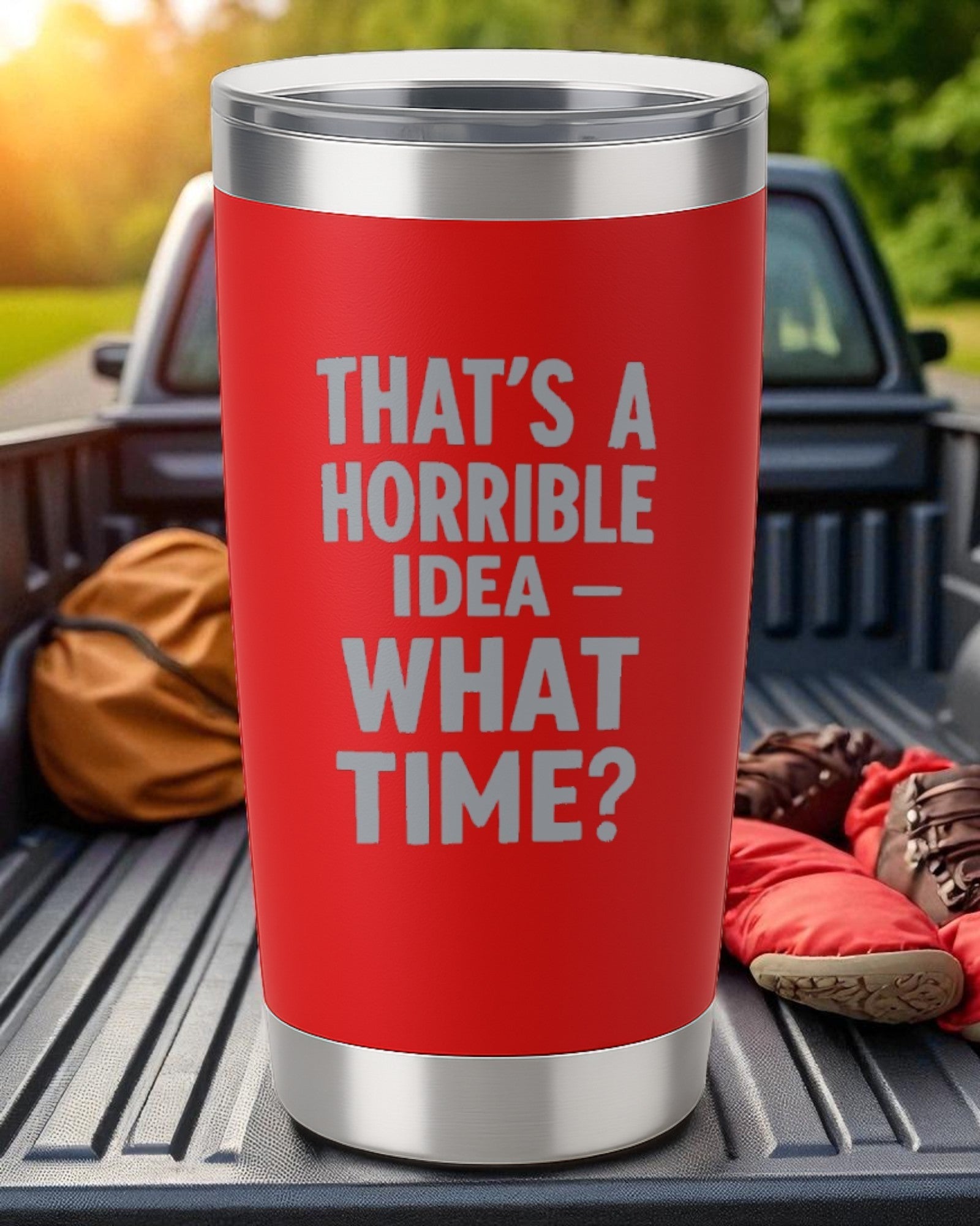 Red 20oz stainless steel tumbler with engraved text "That's a Horrible Idea – What Time?" and clear lid, powder-coated exterior for impulsive caffeine lovers