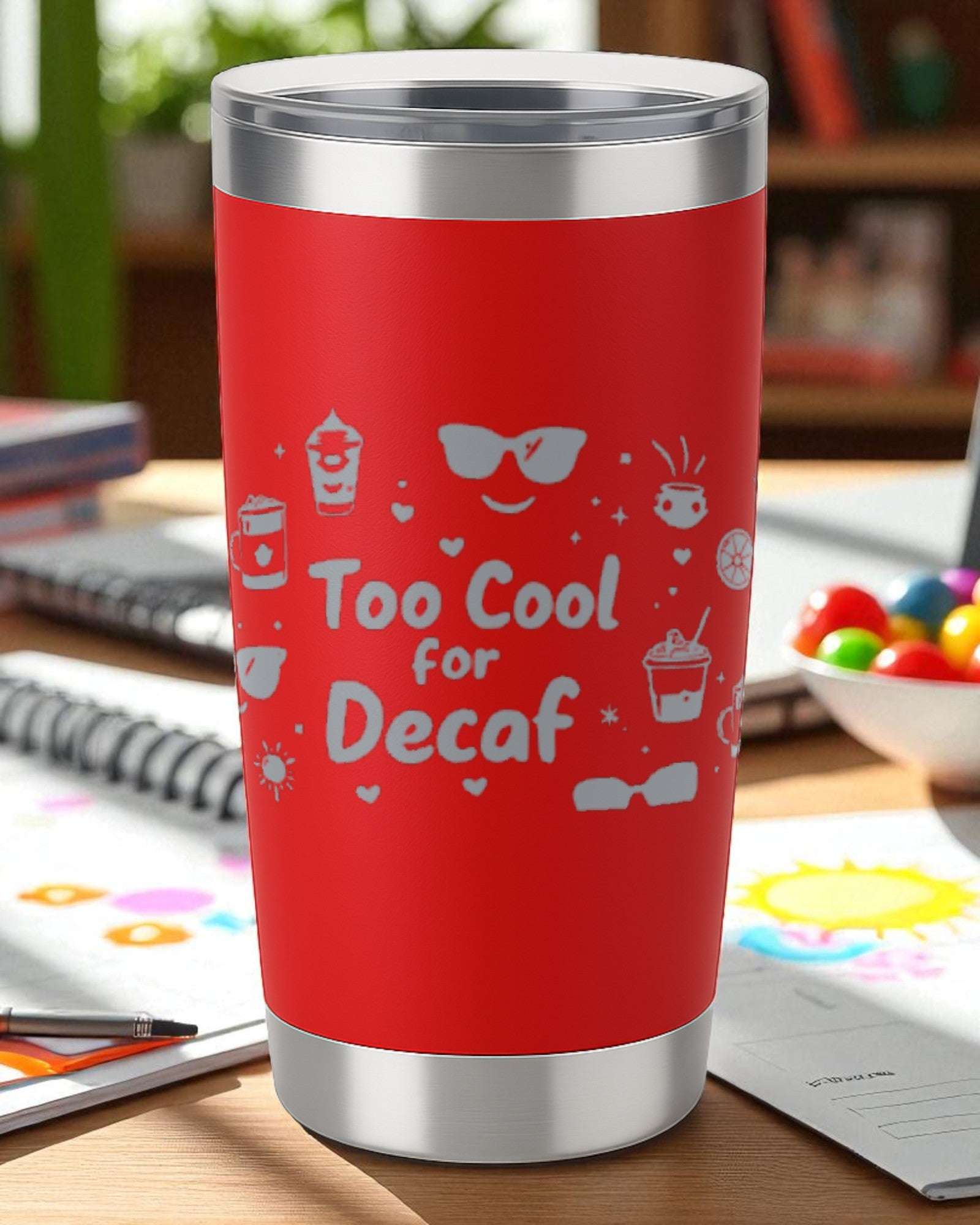 Red 20oz stainless steel insulated tumbler with laser-engraved "Too Cool for Decaf" design and clear lid.