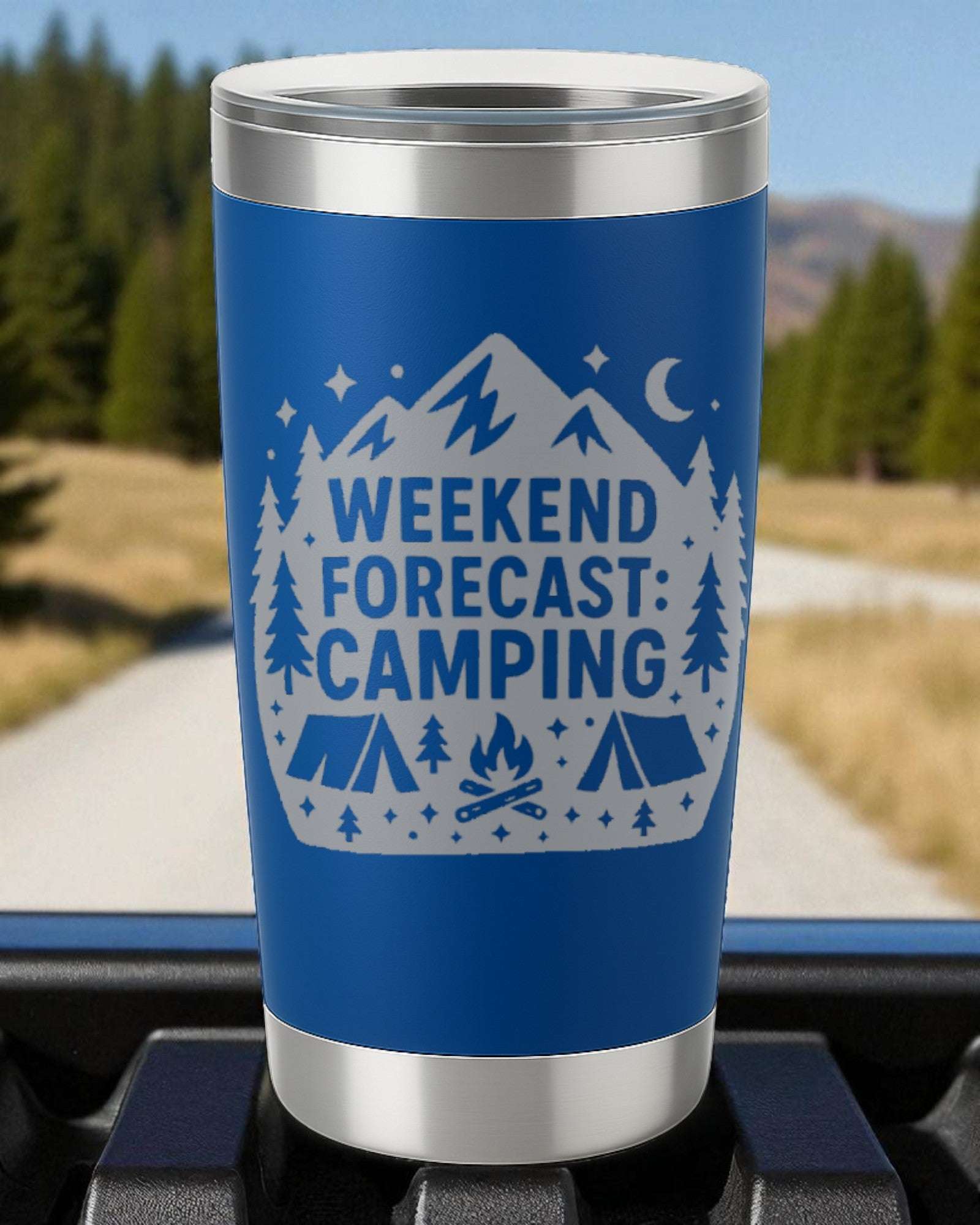 Blue 20oz stainless steel tumbler with laser-engraved "Weekend Forecast: Camping" design featuring mountains, trees, tents, and campfire.